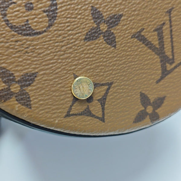 CANNES PM Monogram Coated Canvas Brown
