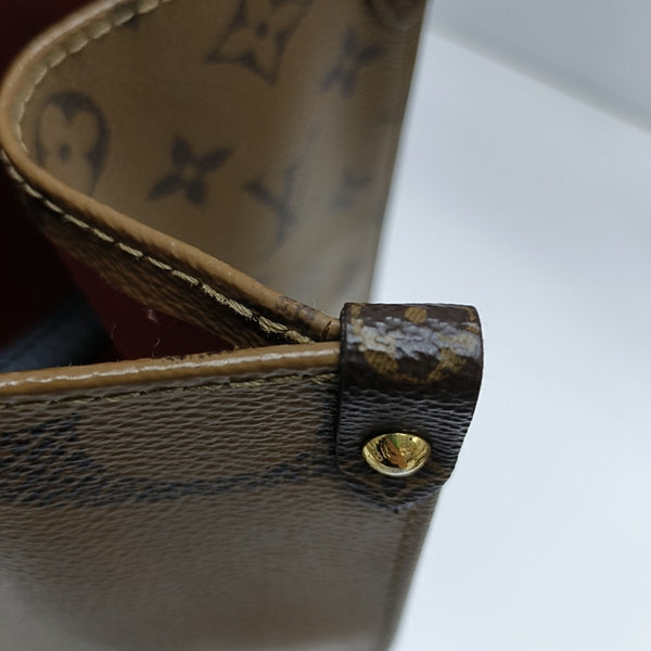 ONTHEGO MM Monogram Coated Canvas Brown