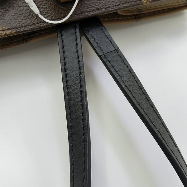 ONTHEGO MM Monogram Coated Canvas Brown