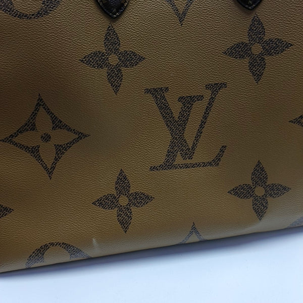 ONTHEGO GM Monogram Coated Canvas Brown