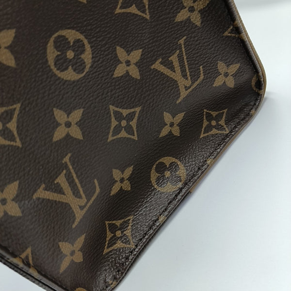 ONTHEGO MM Monogram Coated Canvas Brown