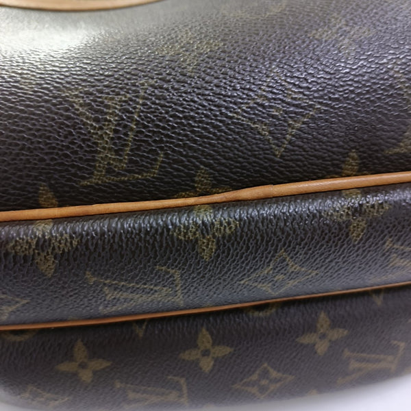REPORTER Monogram Coated Canvas Brown