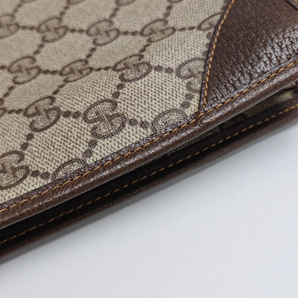 Monogram Coated Canvas Clutch Beige