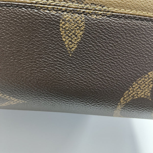 ONTHEGO MM Monogram Coated Canvas Brown