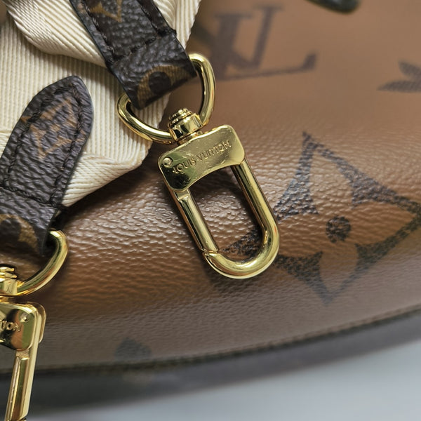 ONTHEGO PM Monogram Coated Canvas Brown