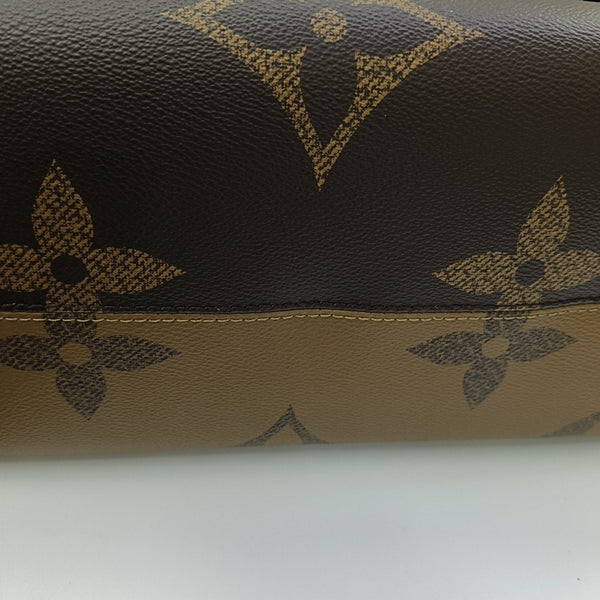 ONTHEGO GM Monogram Coated Canvas Brown