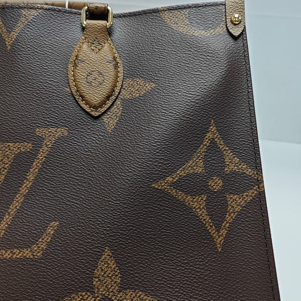 ONTHEGO MM Monogram Coated Canvas Brown