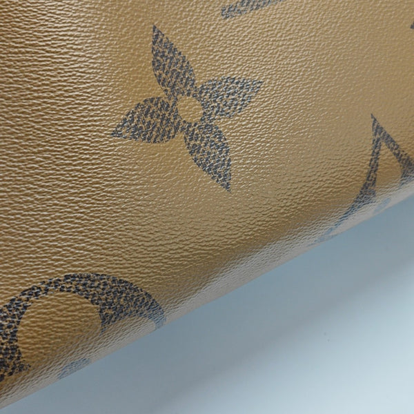 ONTHEGO MM Monogram Coated Canvas Brown