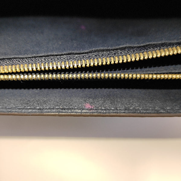 VICTOIRE Monogram Coated Canvas Brown