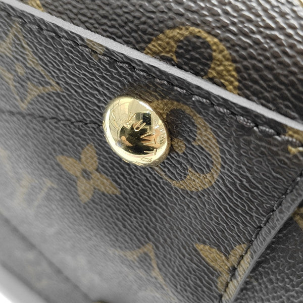 MONTAIGNE GM Monogram Coated Canvas Brown