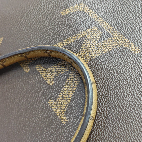 ONTHEGO MM Monogram Coated Canvas Brown