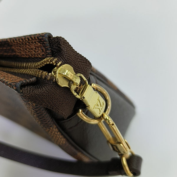 TROUSSE MAKE UP Damier Ebene Coated Canvas Brown