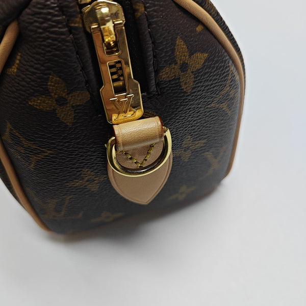 SPEEDY 20 Monogram Coated Canvas Brown
