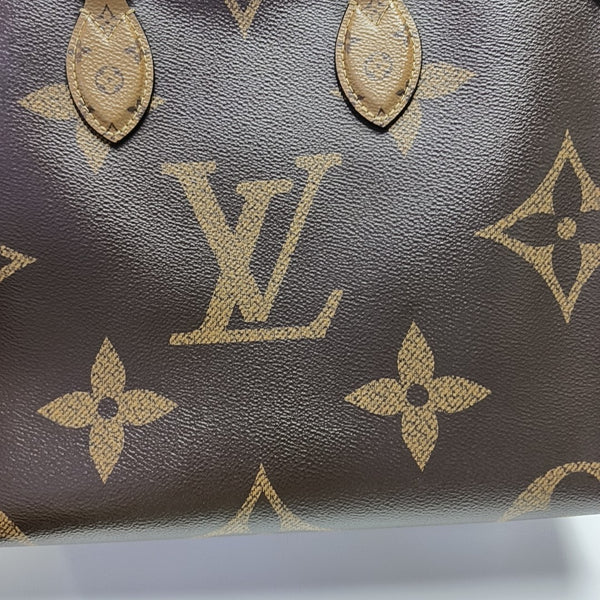ONTHEGO MM Monogram Coated Canvas Brown