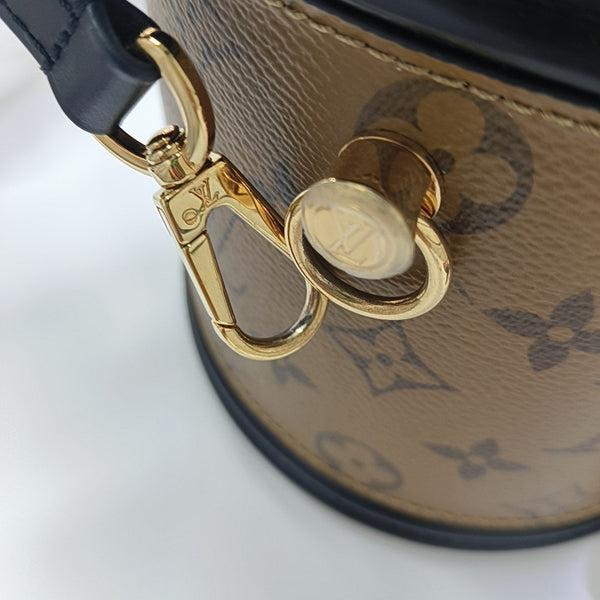 CANNES PM Monogram Coated Canvas Brown