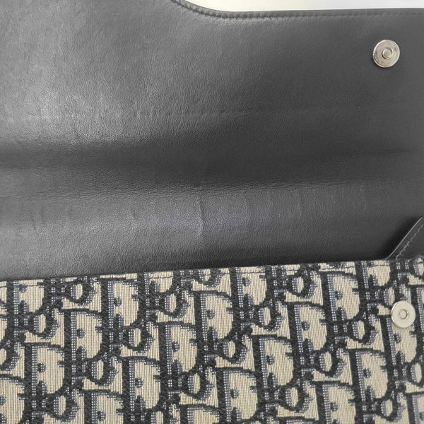 Oblique Canvas Clutch Blue