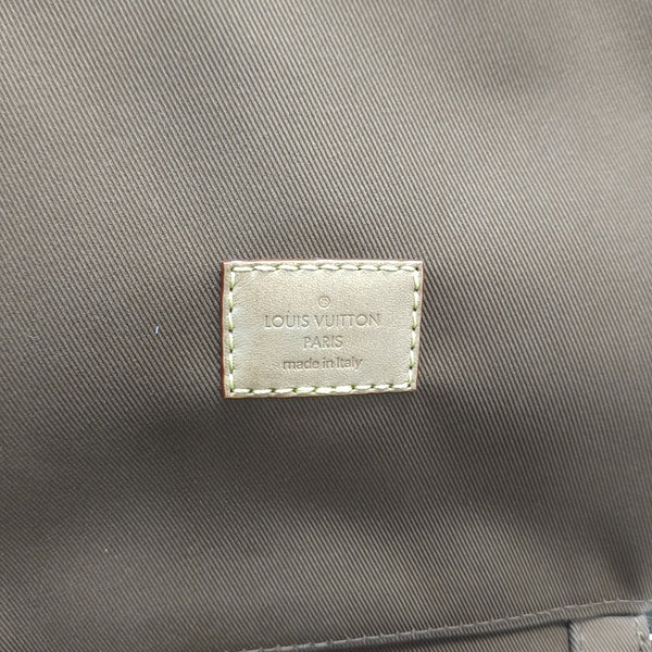 Monogram Coated Canvas Clutch Brown