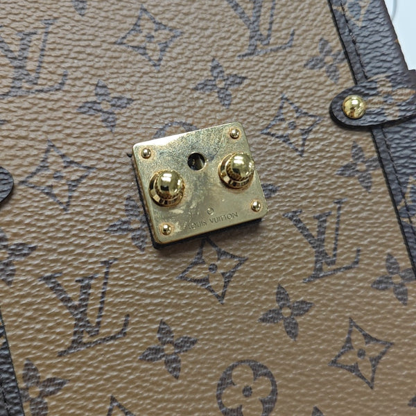 TRUNK Monogram Coated Canvas Brown