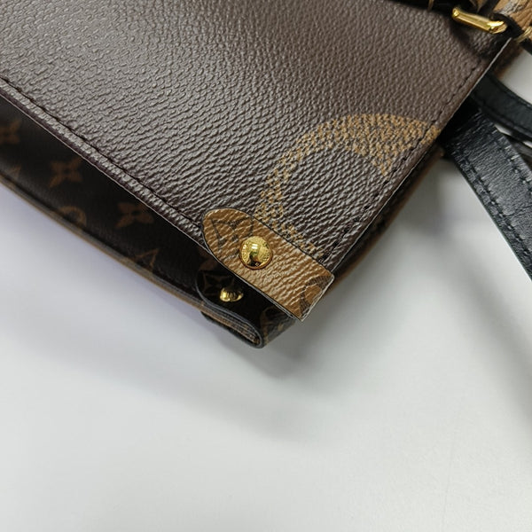 ONTHEGO MM Monogram Coated Canvas Brown