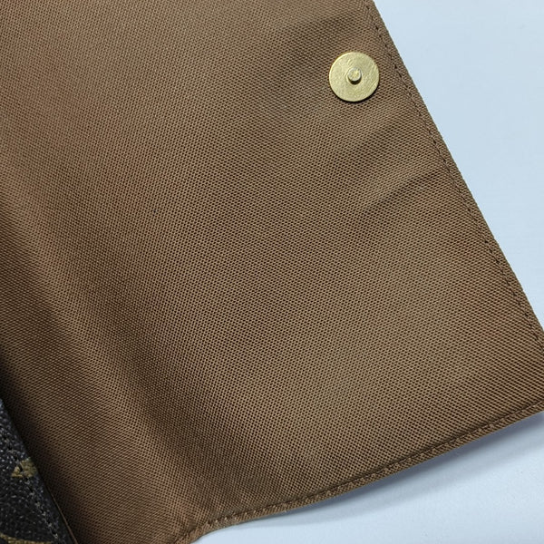 LOOPING PM Monogram Coated Canvas Brown