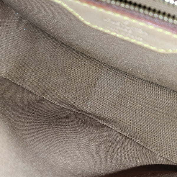 SOLOGNE PM Monogram Coated Canvas Brown