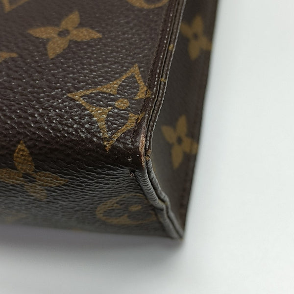 TOILET POCKET 26 Monogram Coated Canvas Brown