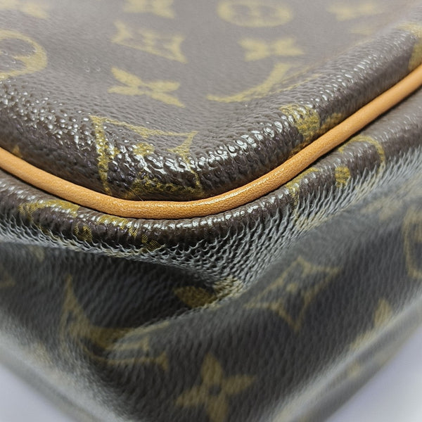 REPORTER GM Monogram Coated Canvas Brown