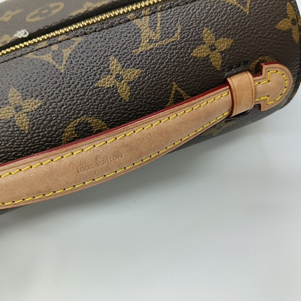 MÉTIS EAST WEST Monogram Coated Canvas Brown