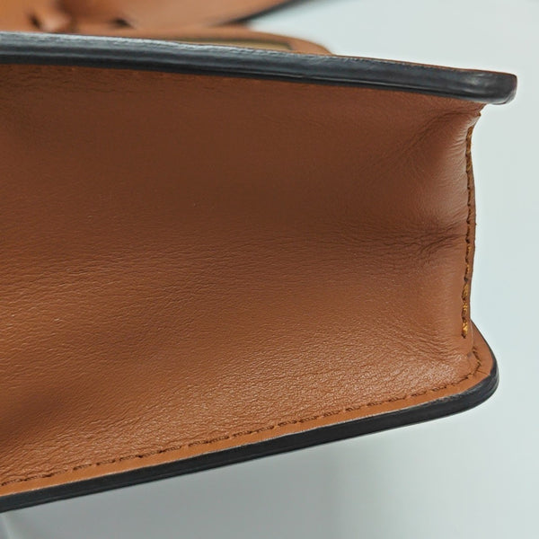 DAUPHINE Monogram Coated Canvas Brown