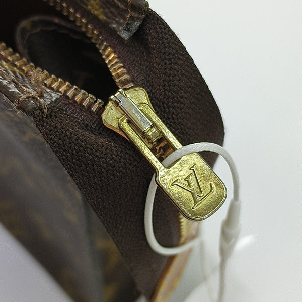 TOILET POCKET Monogram Coated Canvas Brown