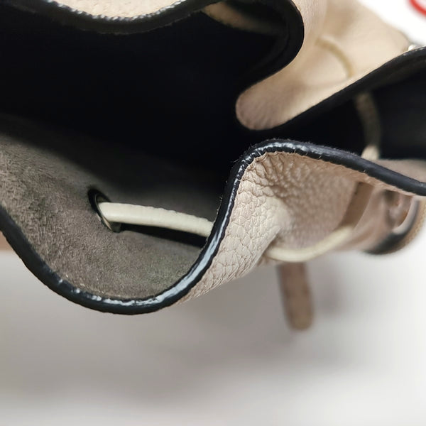 Authenticated pre-owned Mon Tresor Calfskin Beige - Bucket Bag at Looply