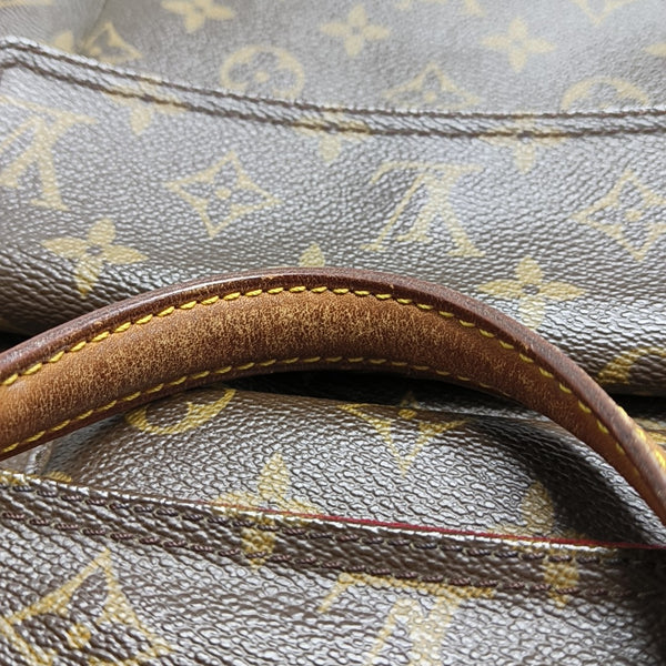EXCENTRI-CITE Monogram Coated Canvas Brown