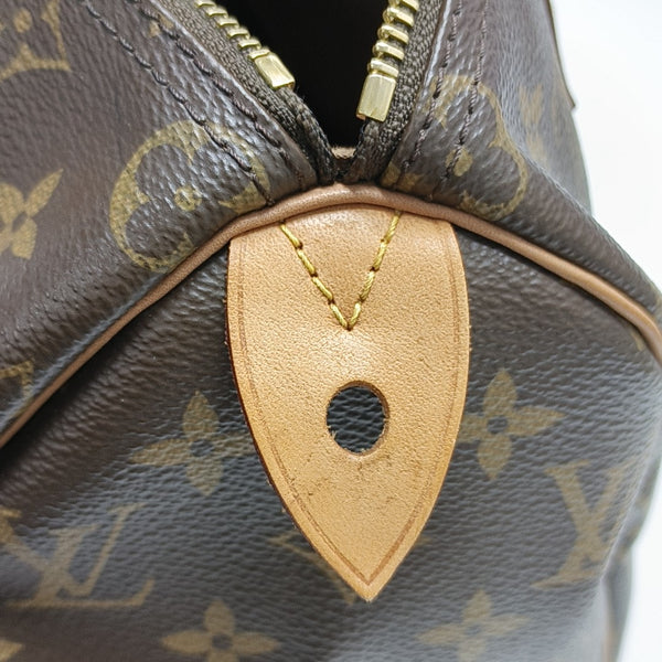 SPEEDY 25 Monogram Coated Canvas Brown