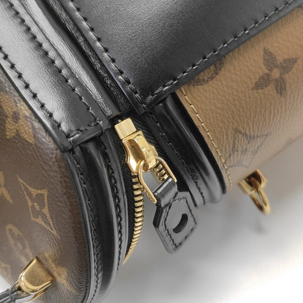 CANNES PM Monogram Coated Canvas Brown