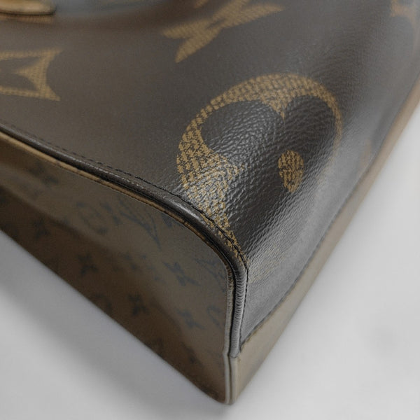 ONTHEGO MM Monogram Coated Canvas Brown