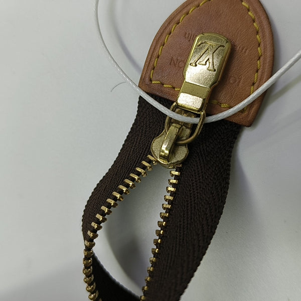 TOILET POCKET 19 Monogram Coated Canvas Brown