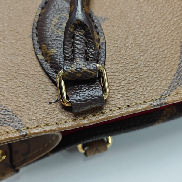 ONTHEGO PM Monogram Coated Canvas Brown