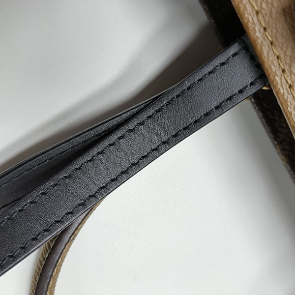 ONTHEGO MM Monogram Coated Canvas Brown