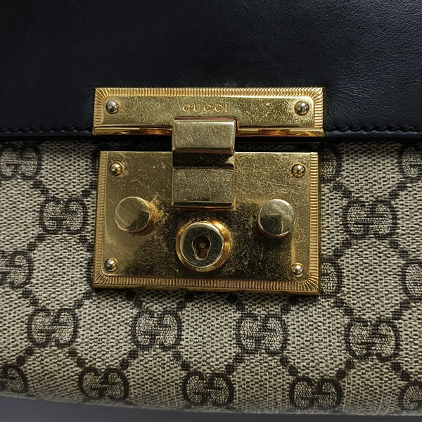 Authenticated pre-owned Padlock Medium Monogram Coated Canvas Beige - Shoulder Bag at Looply