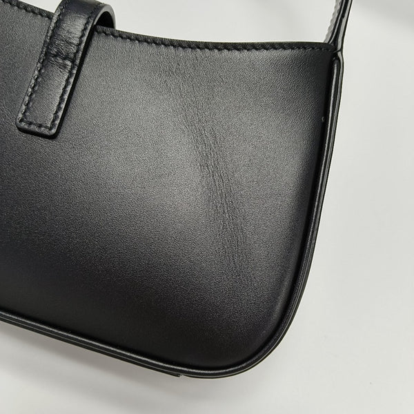 Authenticated pre-owned LE 5 À 7 Calfskin Black - Top Handle Bag at Looply