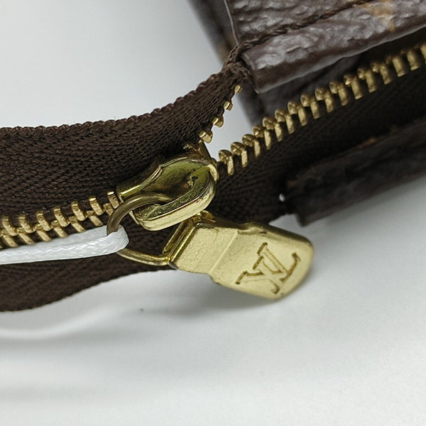TOILET POCKET 19 Monogram Coated Canvas Brown