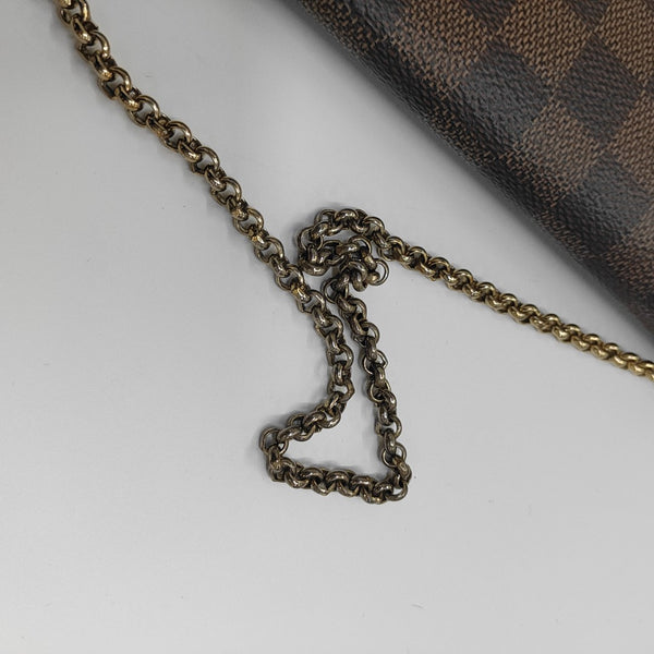 FAVORITE PM Damier Ebene Coated Canvas Brown
