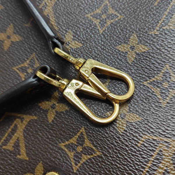 MONTAIGNE GM Monogram Coated Canvas Brown