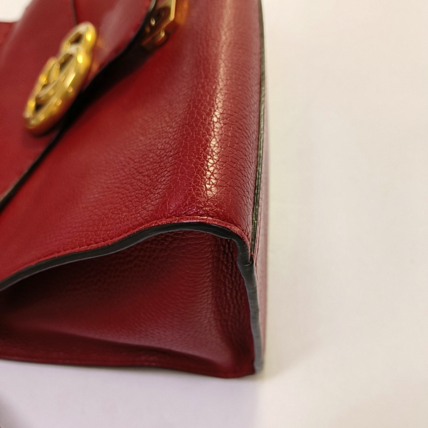 Authenticated pre-owned GG Marmont Top Handle Small Calfskin Red - Shoulder Bag at Looply