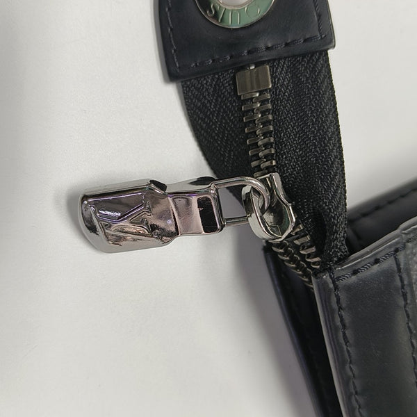 Pochette Voyag MM Monogram Coated Canvas Black