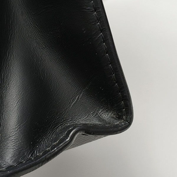 Pochette Voyag MM Monogram Coated Canvas Black