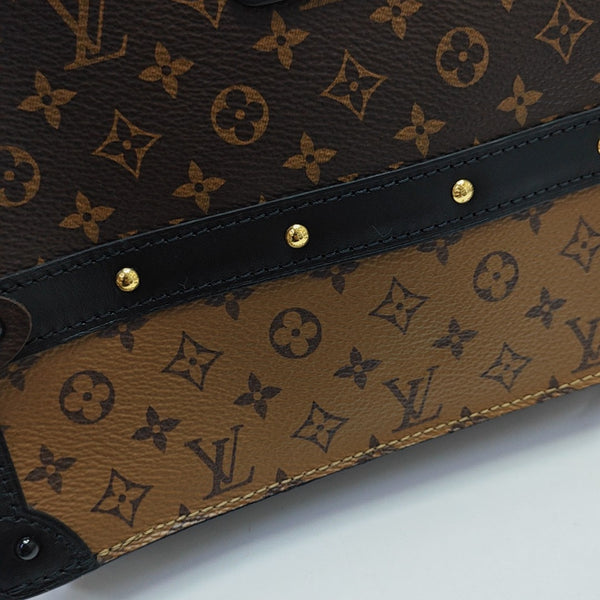 TRUNK Monogram Coated Canvas Brown