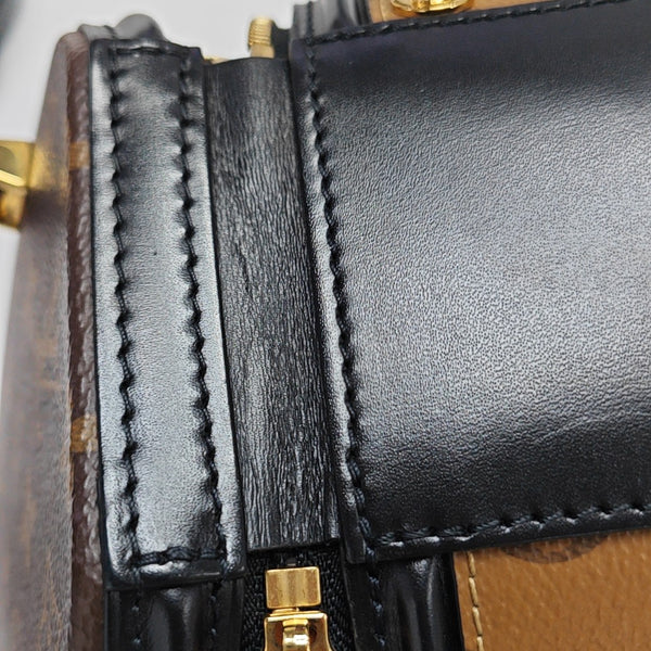 CANNES PM Monogram Coated Canvas Brown
