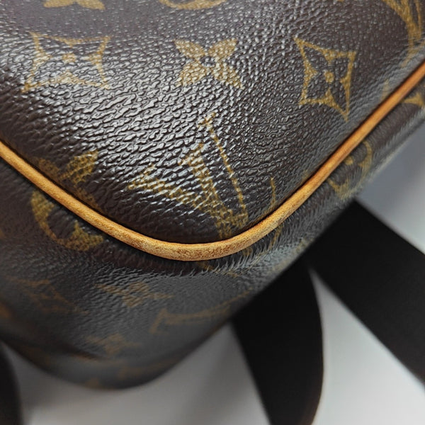 REPORTER Monogram Coated Canvas Brown