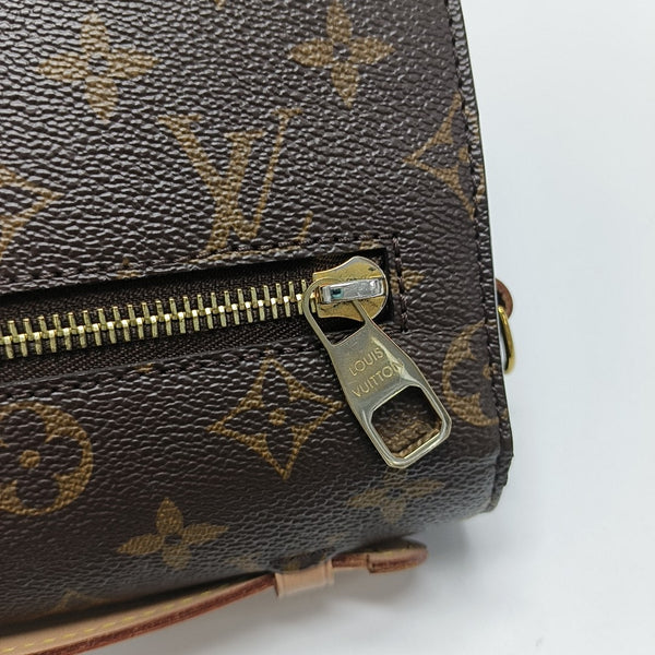 MÉTIS MM Monogram Coated Canvas Brown